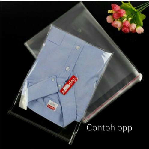 

Plastik Packing Baju Plastik OPP SEAL LEM KEMASAN BAJU / PLASTIK BENING Custom Sablon 25x35 / 30x40
