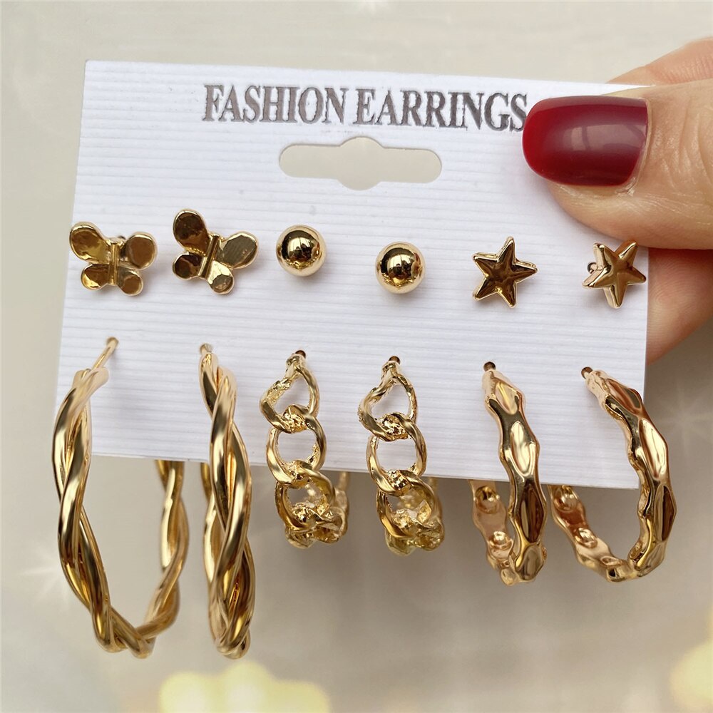 Set Anting Hoop Desain Kupu-Kupu Aksen Mutiara Bahan Logam Gaya Punk Vintage Untuk Wanita