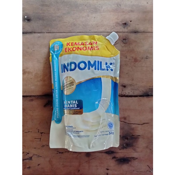 

INDOMILK susu Kental Manis 545 gram (kemasan corong)