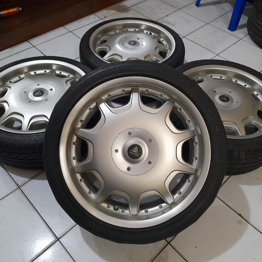 velg mobil bekas ring 18 pcd 8x100-114 warna silver plus ban kondisi 75% plus ban 235 45 r18