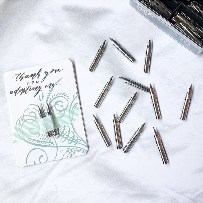 

kaligrafi-perlengkapan- nikko g nib - fairly medium flexibility - smooth with no scratchiness