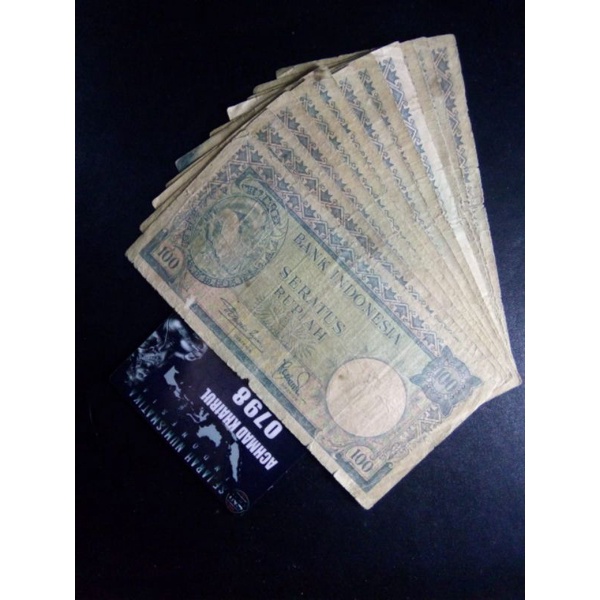 uang kertas seri hewan tupai 100 rupiah