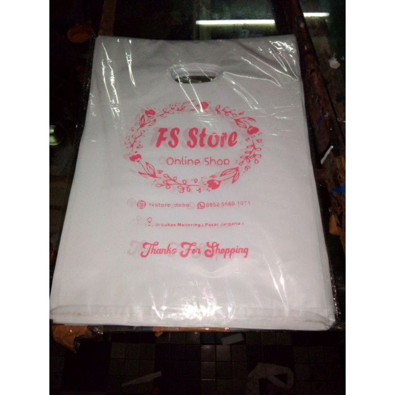 

Plastik plus sablon nama toko ukuran 25x35 isi 250pcs