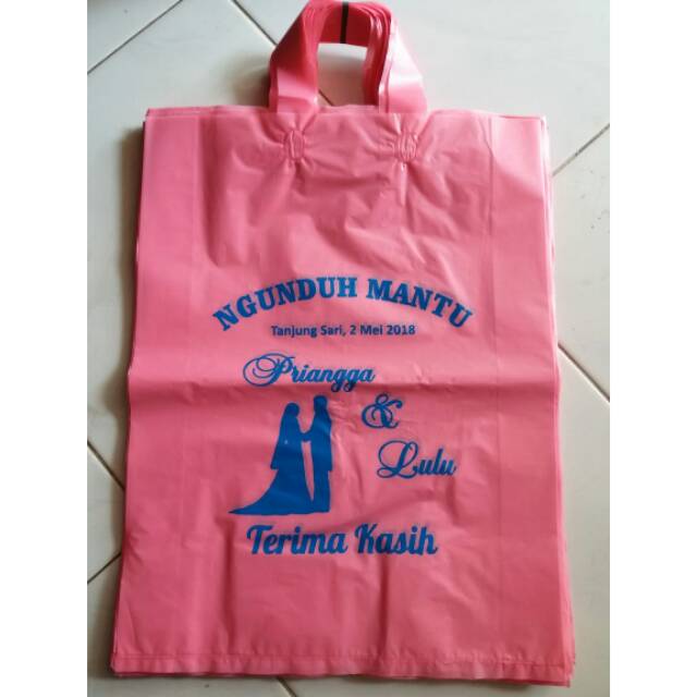 

Kantong Plastlk Sablon 30x40 Handle/Tali