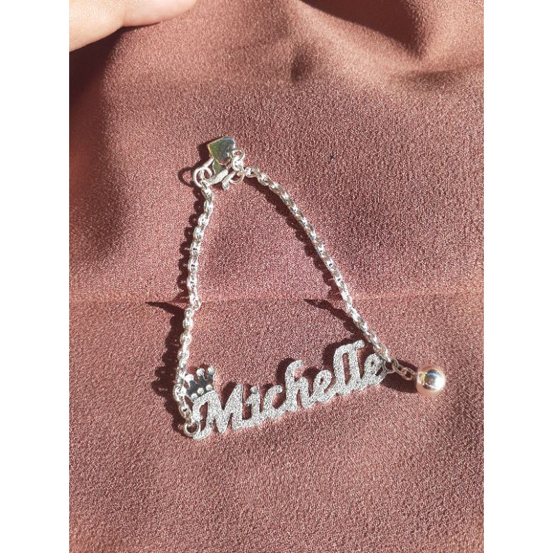 gelang tangan costume nama krincing di samping nama perak asli