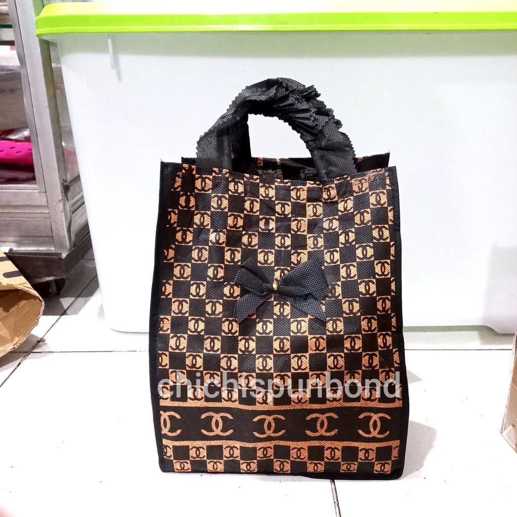 tas hajatan spunbond nindy chanel 22 lusinan