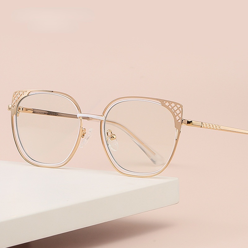 Kacamata Desain Mata Kucing Hollow Bahan Metal Untuk Wanita