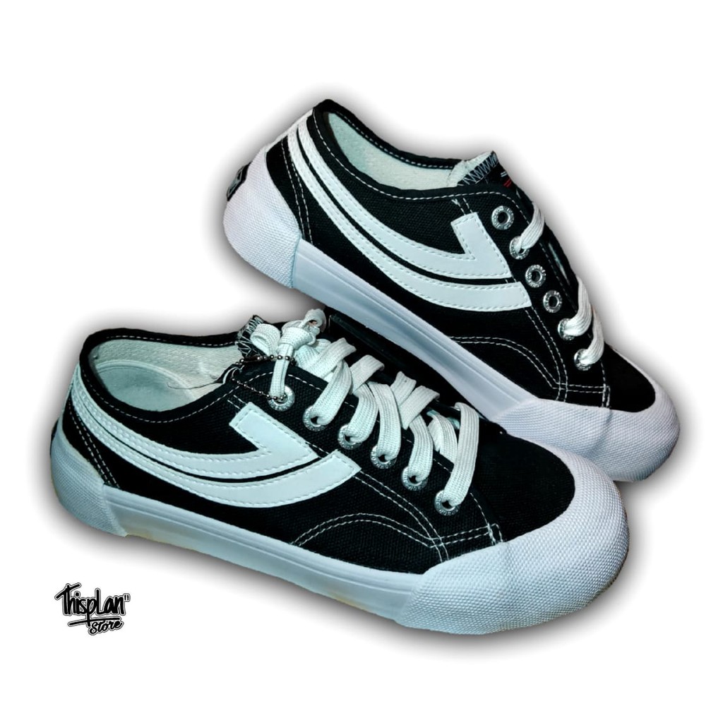 SEPATU JOHNSON LOW BLACK WHITE