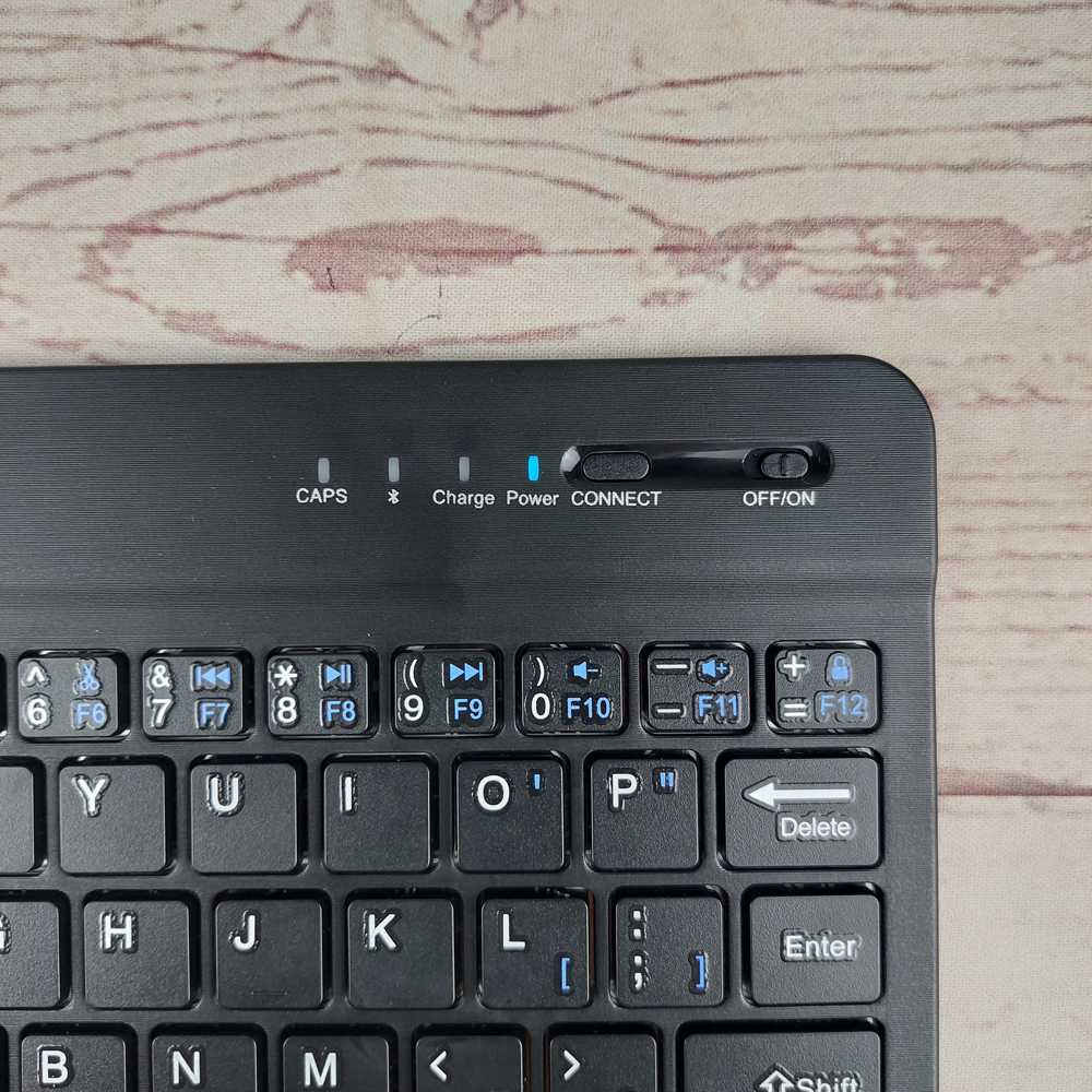 Wireless Bluetooth Keyboard Rechargeable / Wireless Bluetooth Keyboard Rechargeable Murah Berkualitas / Keyboard Wireless Bluetooth Modern Warna Hitam Bentuk Minimalis Dengan Design Yang Slim Dan Tipis / Keyboard Bluetooth Batrai