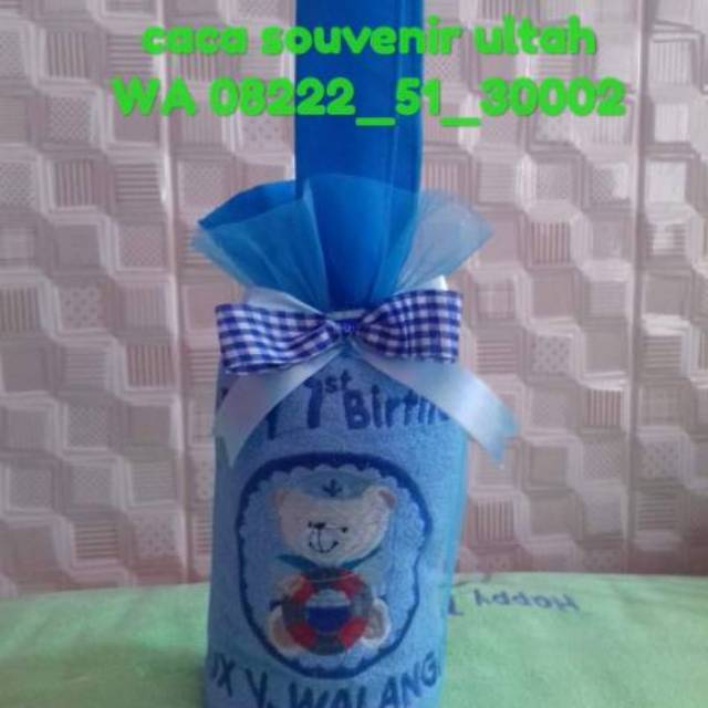 Souvenir handuk bordir dan kemas tile