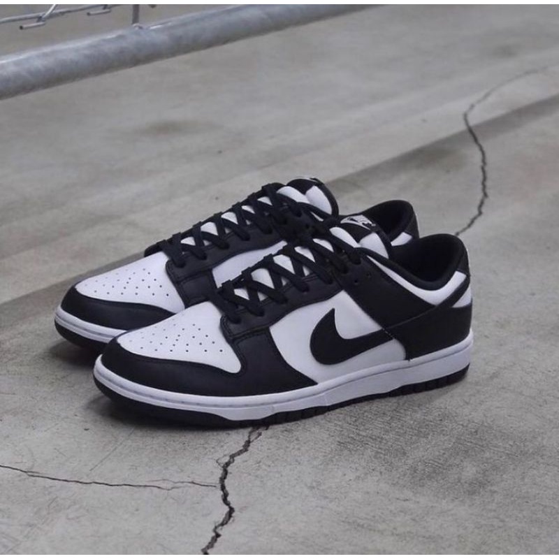 white and black low dunks