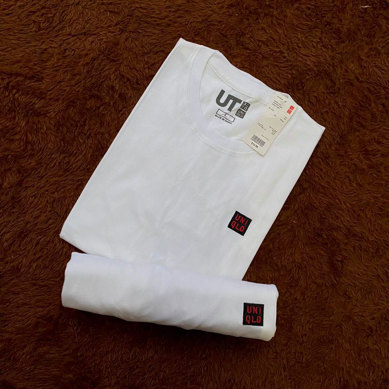 Kaos uniqlo pria polos motif logo bordir-Putih