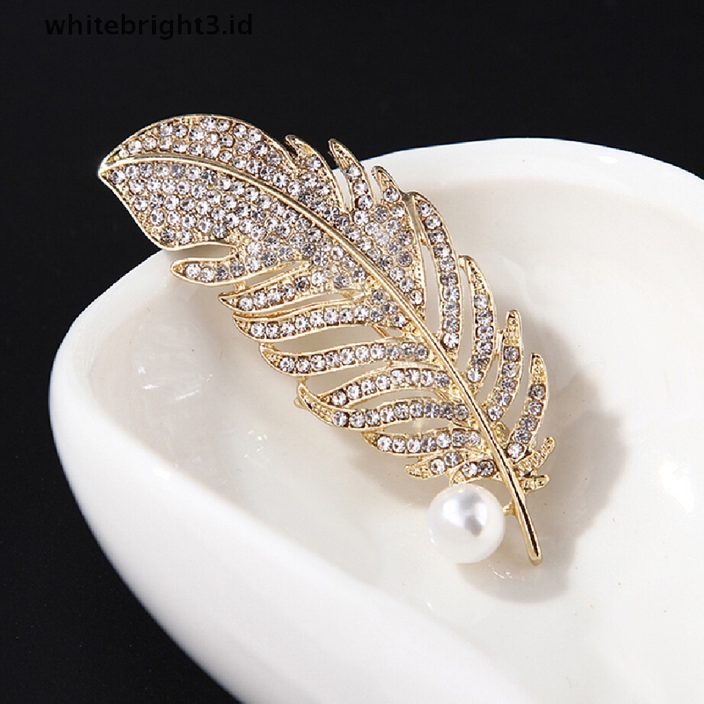 (whitebright3.id) Bros Pin Bentuk Bulu Aksen Kristal + Mutiara Imitasi Untuk Wanita