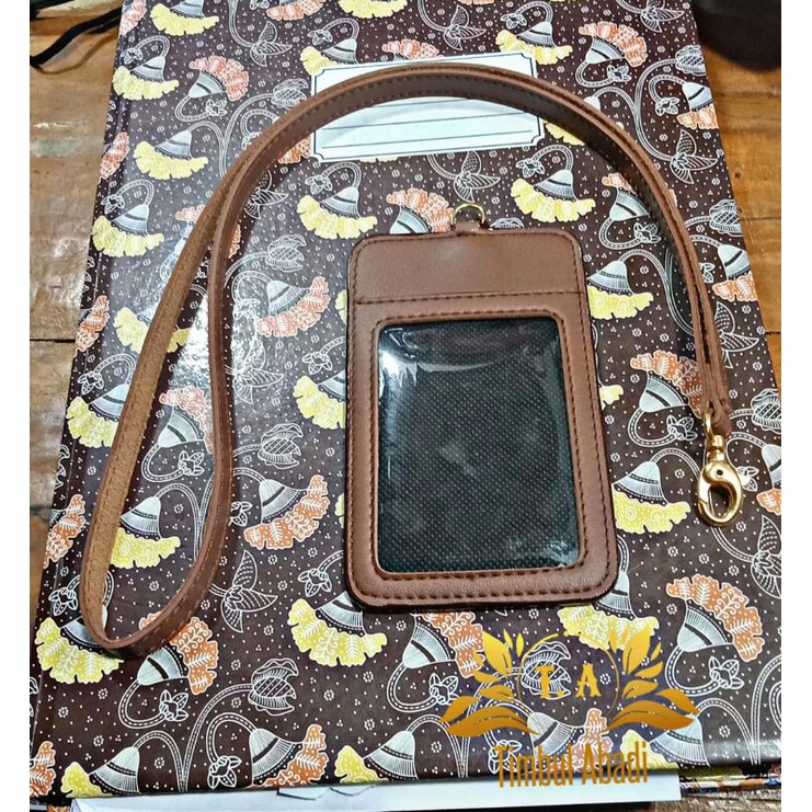 

casing,tempat kartu Id card/identitas kantor bahan kulit warna coklat