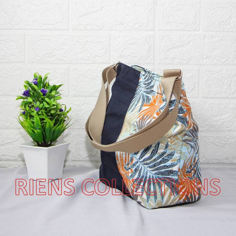 RIENS COLLECTIONS. TAS SELEMPANG SLING BAG KANVAS KOMBINASI FLORAL PALM ORANGE SLC0102