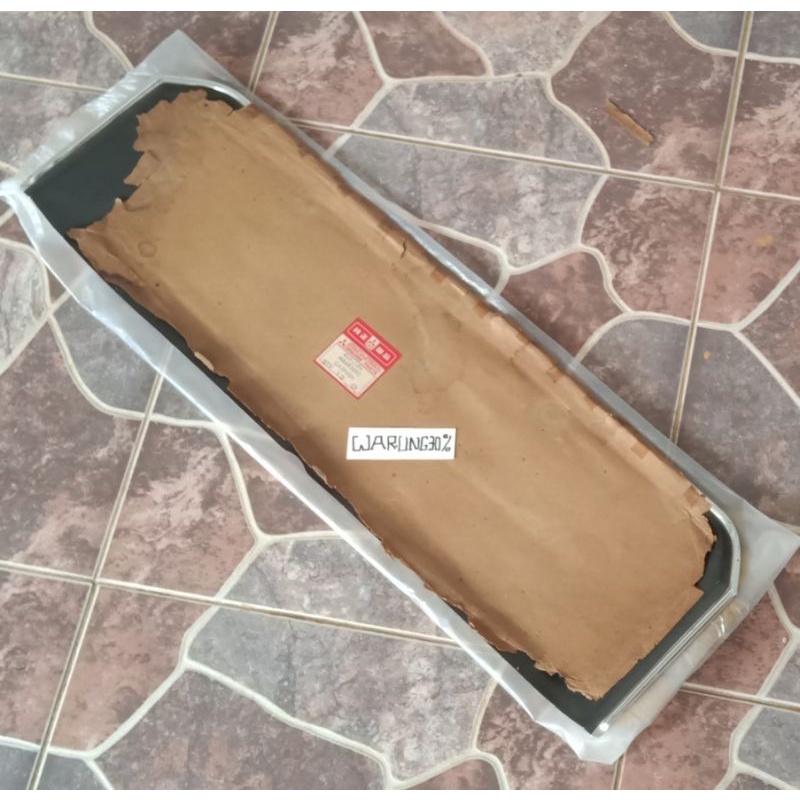 Garnish Tatakan  plat nomor belakang Mitshubishi colt galant sigma A123A lampu bulat original baru