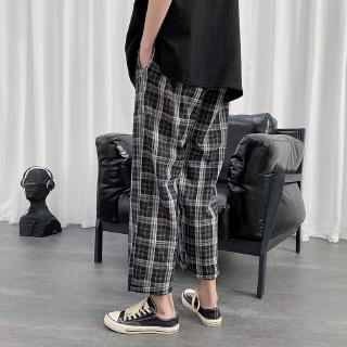 Celana Panjang Model Longgar Lebar Lurus Motif Kotak Kotak Celana Panjang Model Longgar Lebar Lurus Motif Kotak Kotak
