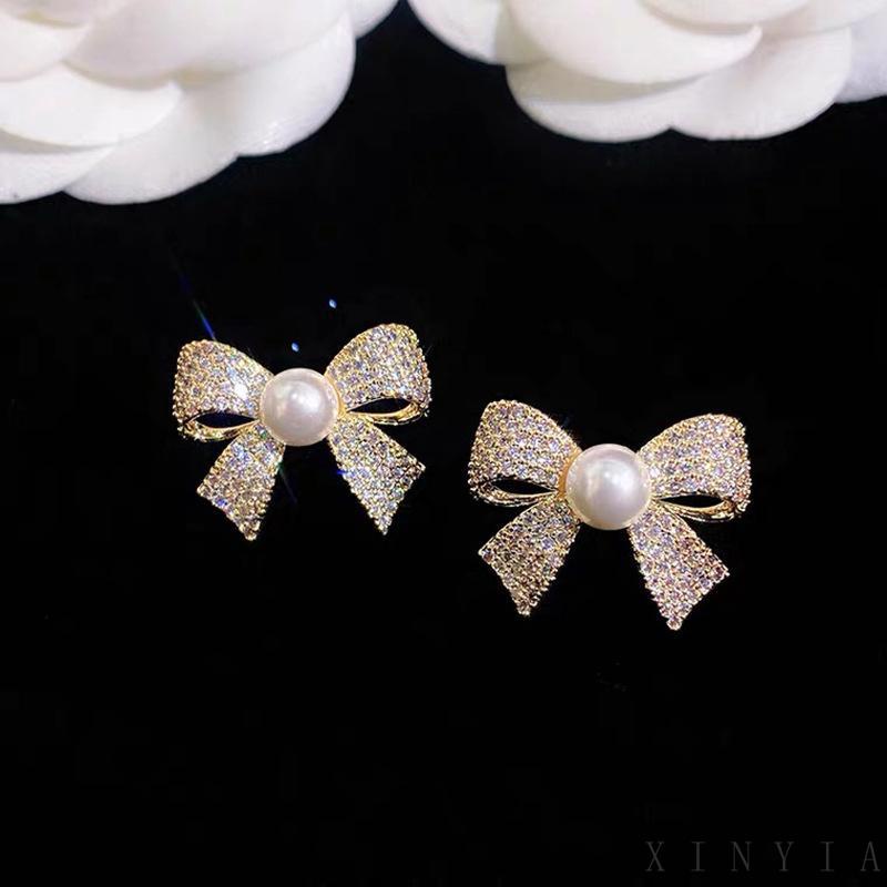 Xia.id Anting Tusuk Gantung Desain Pita Hias Mutiara Gaya Trendy / Simple Untuk Wanita