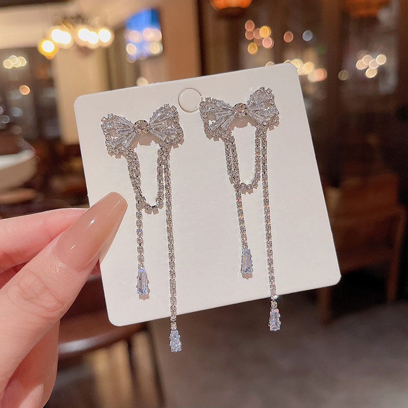 Kualitas Tinggi925 Perak Jarum Mewah Panjang Rumbai Busur Anting Wanita Fashion Indah Zirkon Perhiasan Super Berkilau