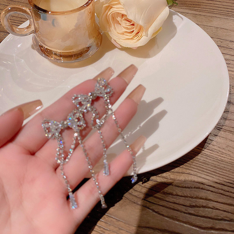 Kualitas Tinggi925 Perak Jarum Mewah Panjang Rumbai Busur Anting Wanita Fashion Indah Zirkon Perhiasan Super Berkilau