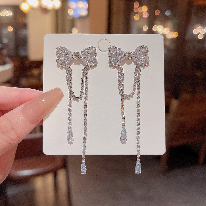 Kualitas Tinggi925 Perak Jarum Mewah Panjang Rumbai Busur Anting Wanita Fashion Indah Zirkon Perhiasan Super Berkilau