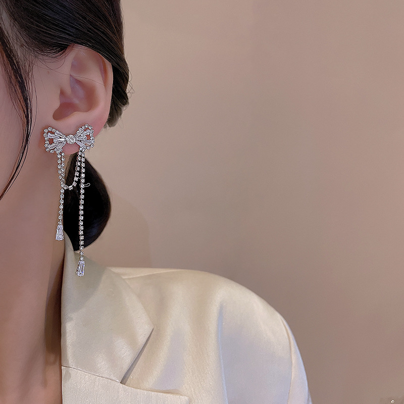 Kualitas Tinggi925 Perak Jarum Mewah Panjang Rumbai Busur Anting Wanita Fashion Indah Zirkon Perhiasan Super Berkilau