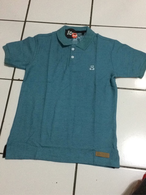 Baju kaos polo merk XIMO