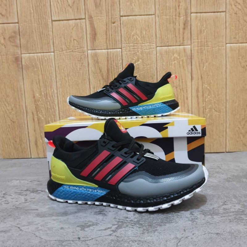 ADIDAS ULTRABOOST ALL TERRAIN "CORE BLACK/SHOCK RED-YELLOW"