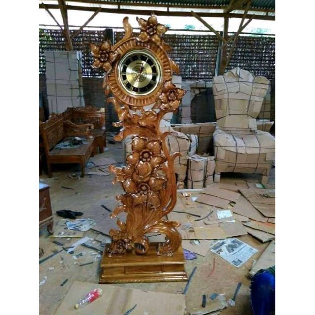 Jam hias ukir jati berdiri cantik