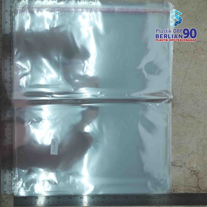 

iDk90 PLASTIK OPP 35 X 40 CM 20 MIC 100LBR / PLASTIK BENING KEMASAN BUNGKUS BAJU GAMIS LEBARAN