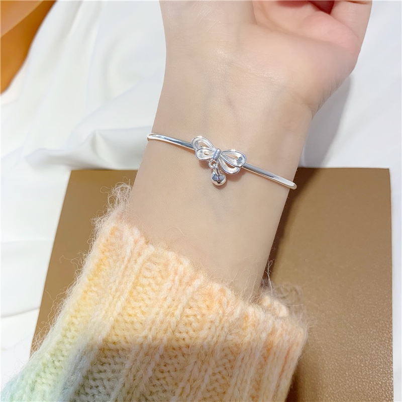 Gelang Desain Pita Lonceng Warna Silver Gaya Korea Untuk Wanita