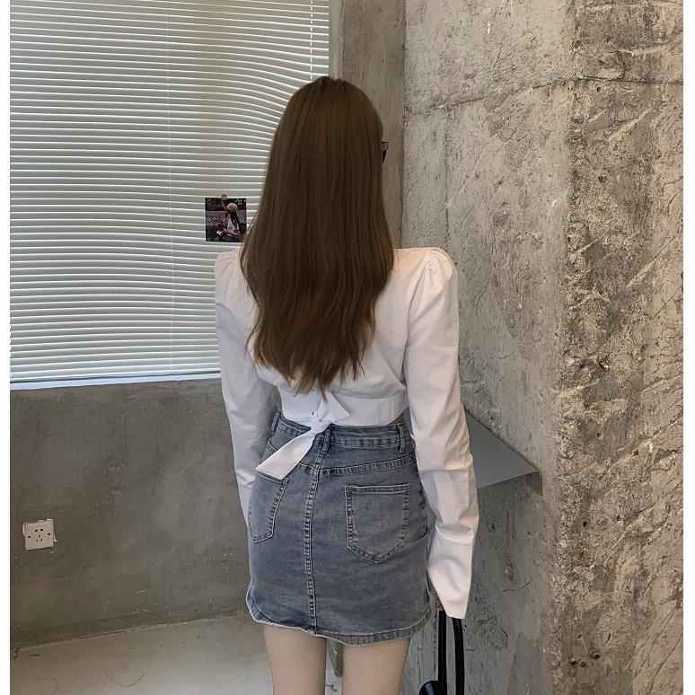 Kemeja putih wanita desain rasa niche cross shirt musim semi baru cahaya akrab gaya pendek Perancis