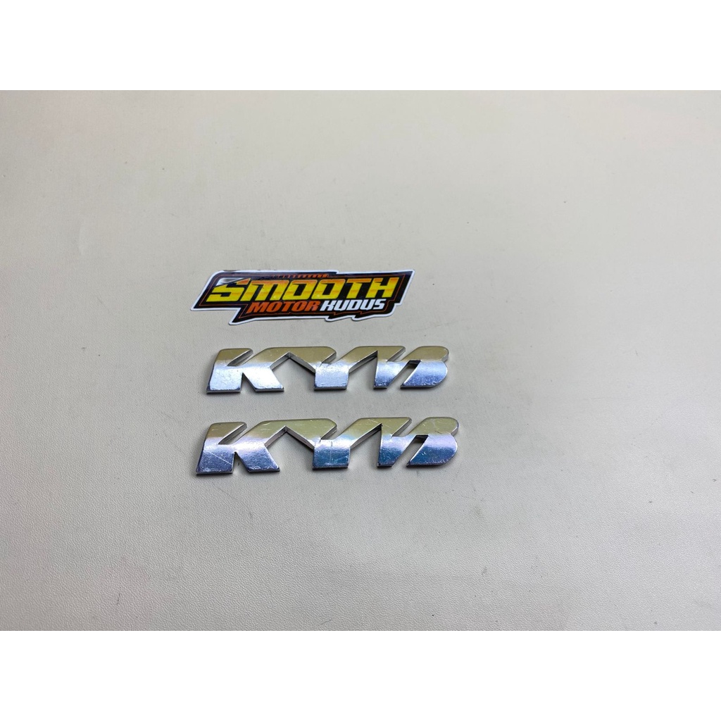 emblem logo timbul kyb shock skok suspensi depan