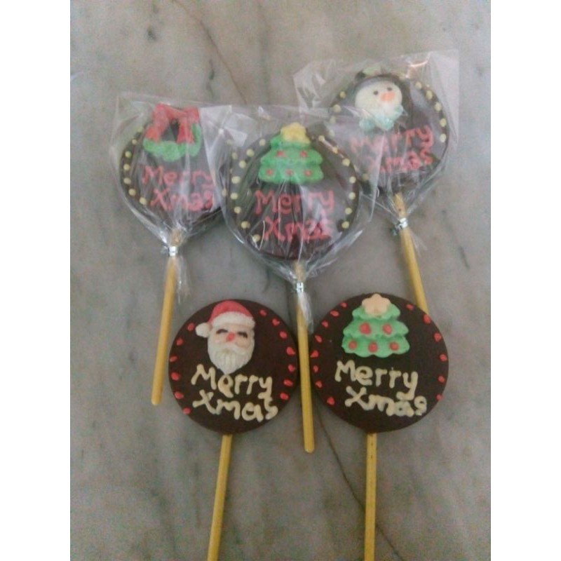 

Lolipop cokelat Merry Xmas handwriting
