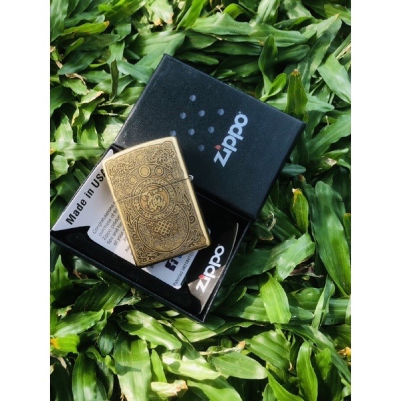 Zippo Motif Grafir 5 Slide Zippo Motif NAGA CENDRAWASIH GOLD Zippo Premium