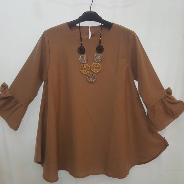 Blouse supernova terlaris