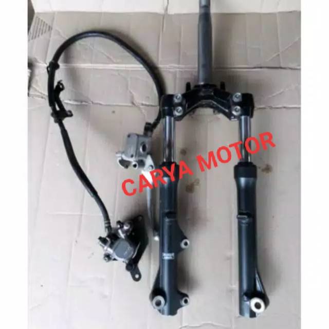 Jual shok shockbreaker depan set segitiga dan cakram Honda Supra x 125 fi asli original terlaris KWW