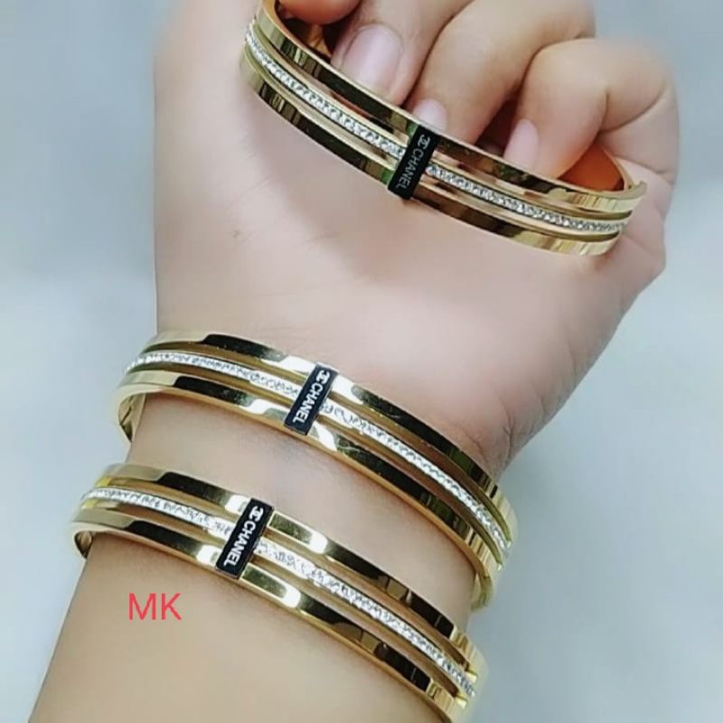 Gelang titanium gold. rodhium. xuping medan sumbayak