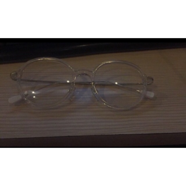 Kacamata HSF Eyewear Transparan Kenzo.