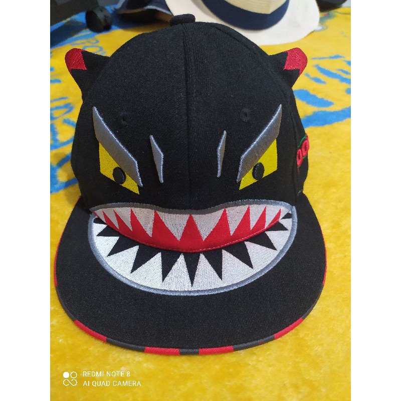 topi elstinko dewasa