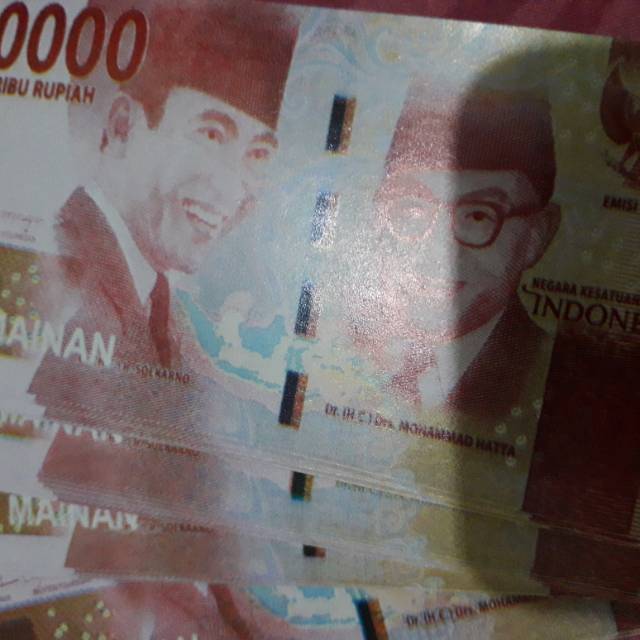 Uang mainan isi 100 lembar