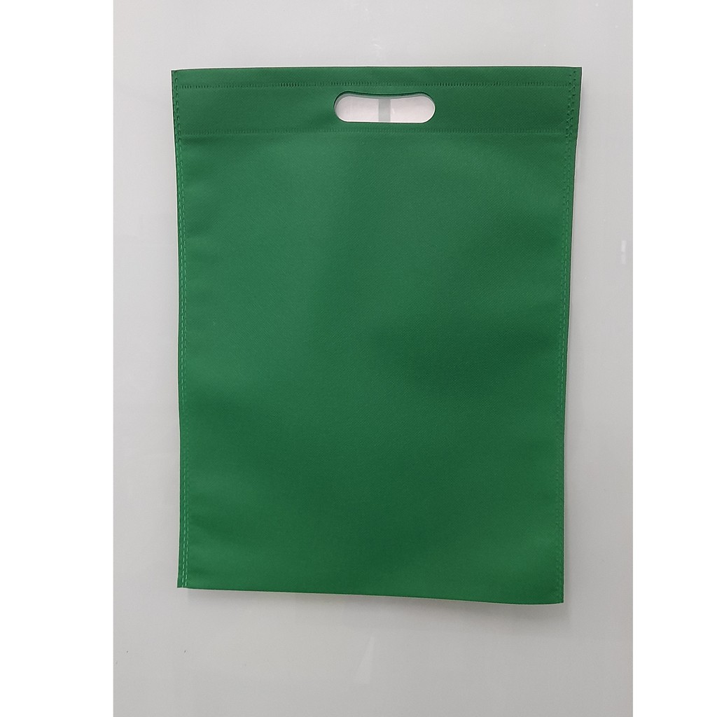 

Tas Press Spunbound Oval Goodie Bag Tas Belanja Warna Hijau Tua 30 cm x 40 cm