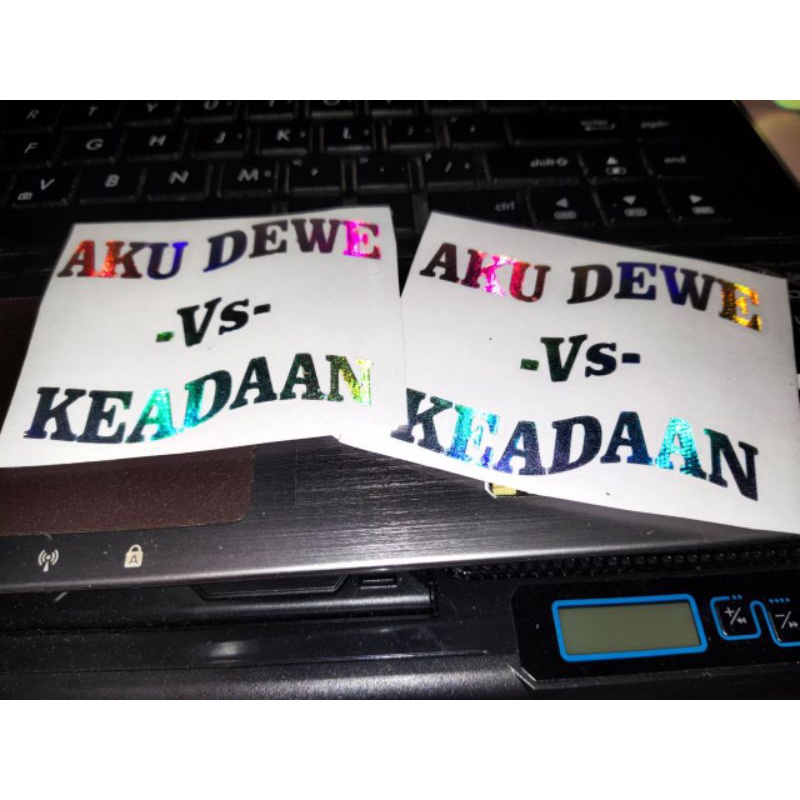 

STICKER HOLOGRAM AKU DEWE VS KEADAAN