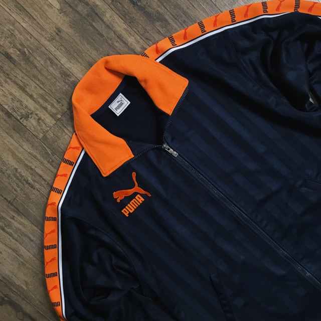 blue and orange puma shirt