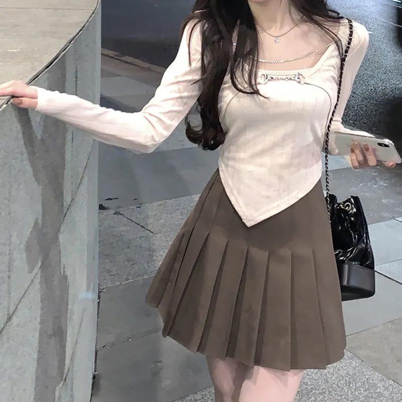Suhao Musim Semi dan Musim Gugur Pure Fashion Dressing Small Fashion Gaya Barat Palsu Dua-piece Pendek Top Wanita Kulit Penutup Rantai T-Shirt Lengan Panjang