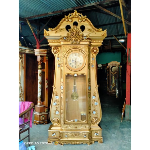 jam hias lemari jam hias kayu jati solid finishing gold