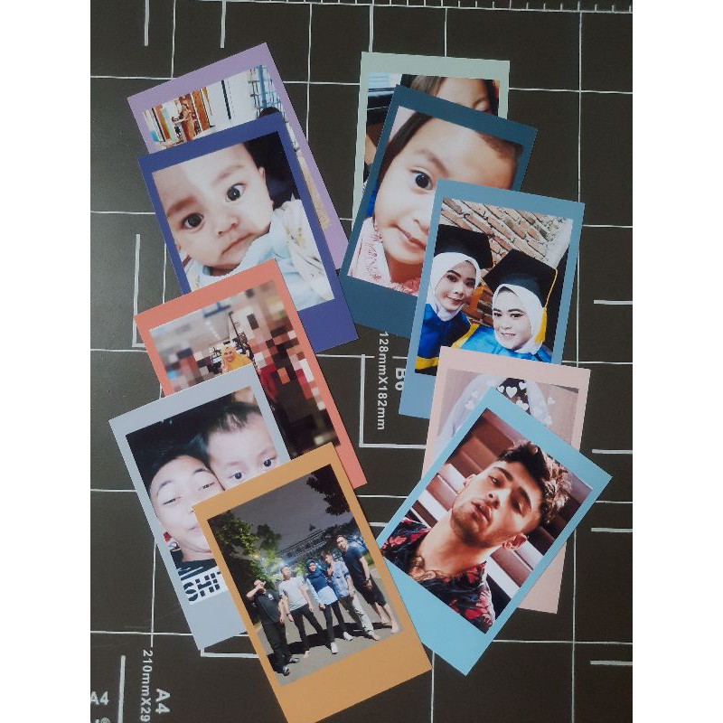 

CETAK POLAROID BERWARNA 2R ISI 15 PCS