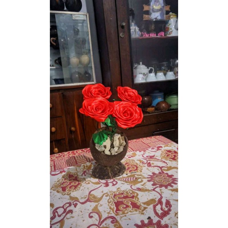 

KerajinanPotbungadarikayu
