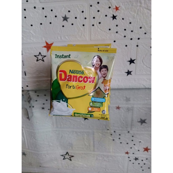 

Susu Dancow Vanila / Putih Sachet 27 g