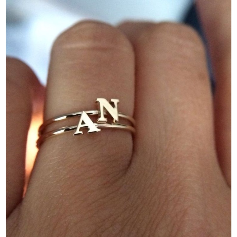 Cincin huruf berlapis emas